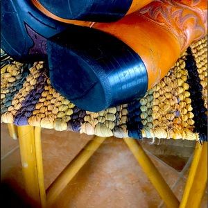 Men’s cowboy boots, size 10, by Ariat. Good condition.